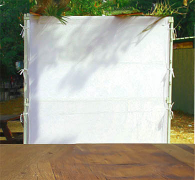 Jewish festival of Sukkot. Traditional succah (hut). Empty wooden old table for product display and presentation